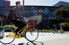 Man riding a bicycle on Google campus