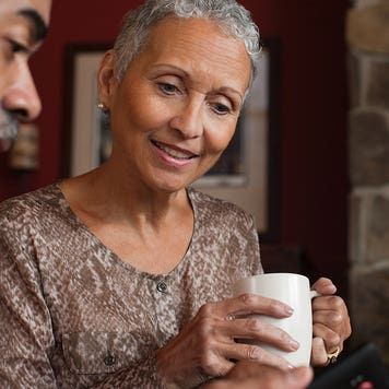 Couple looking at rates on phone