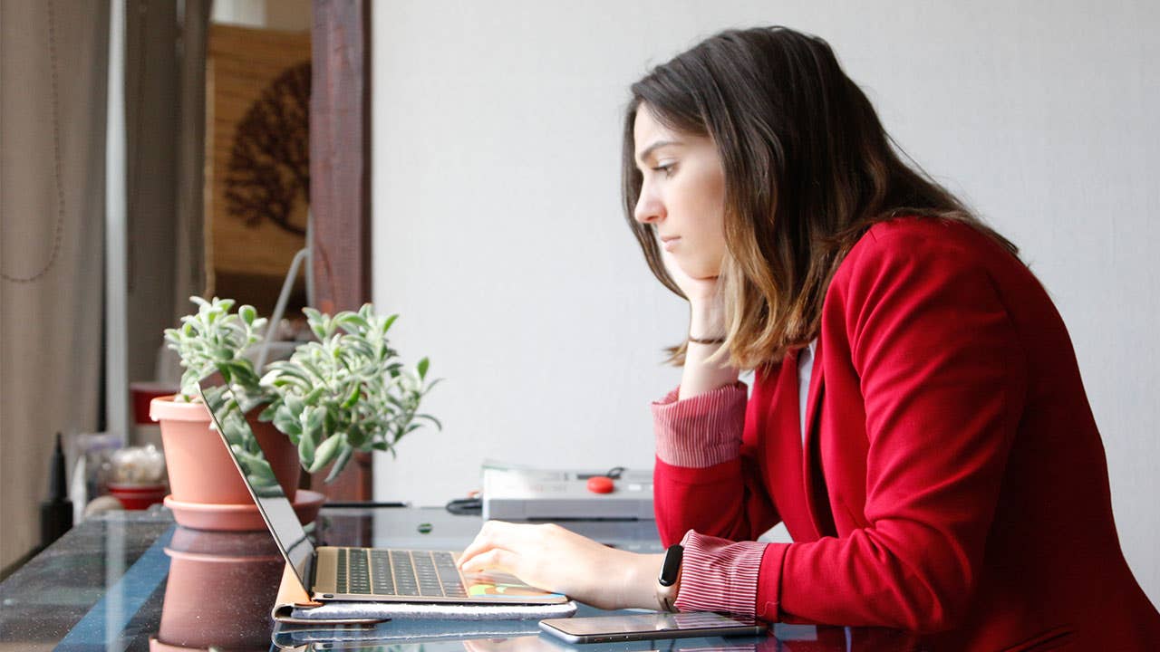 Woman at desk on laptop