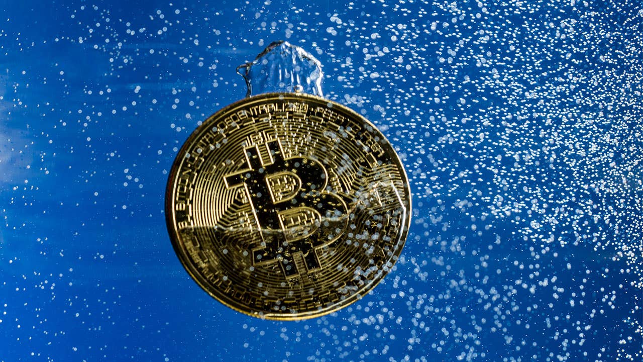 Bitcoin falling into water