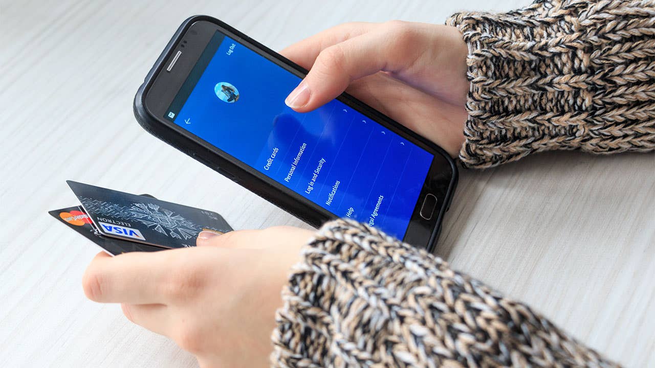 Woman using phone for mobile banking