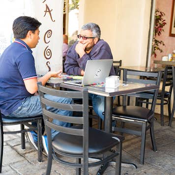 Parent and adult child in cafe