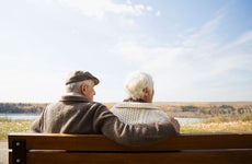 Older couple on park bench