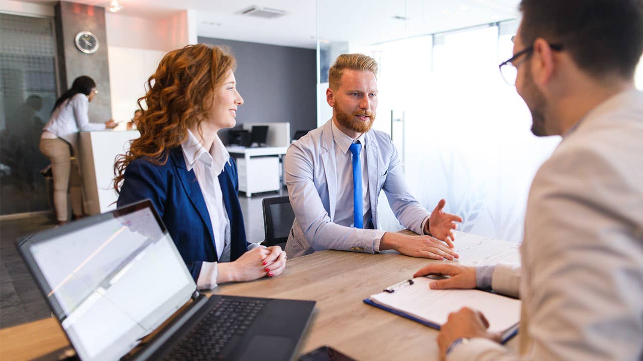 Loan officer and couple meeting