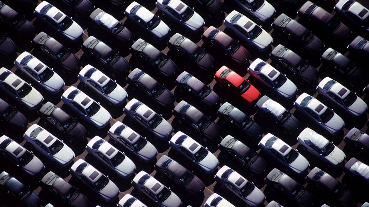 Red car in parking lot