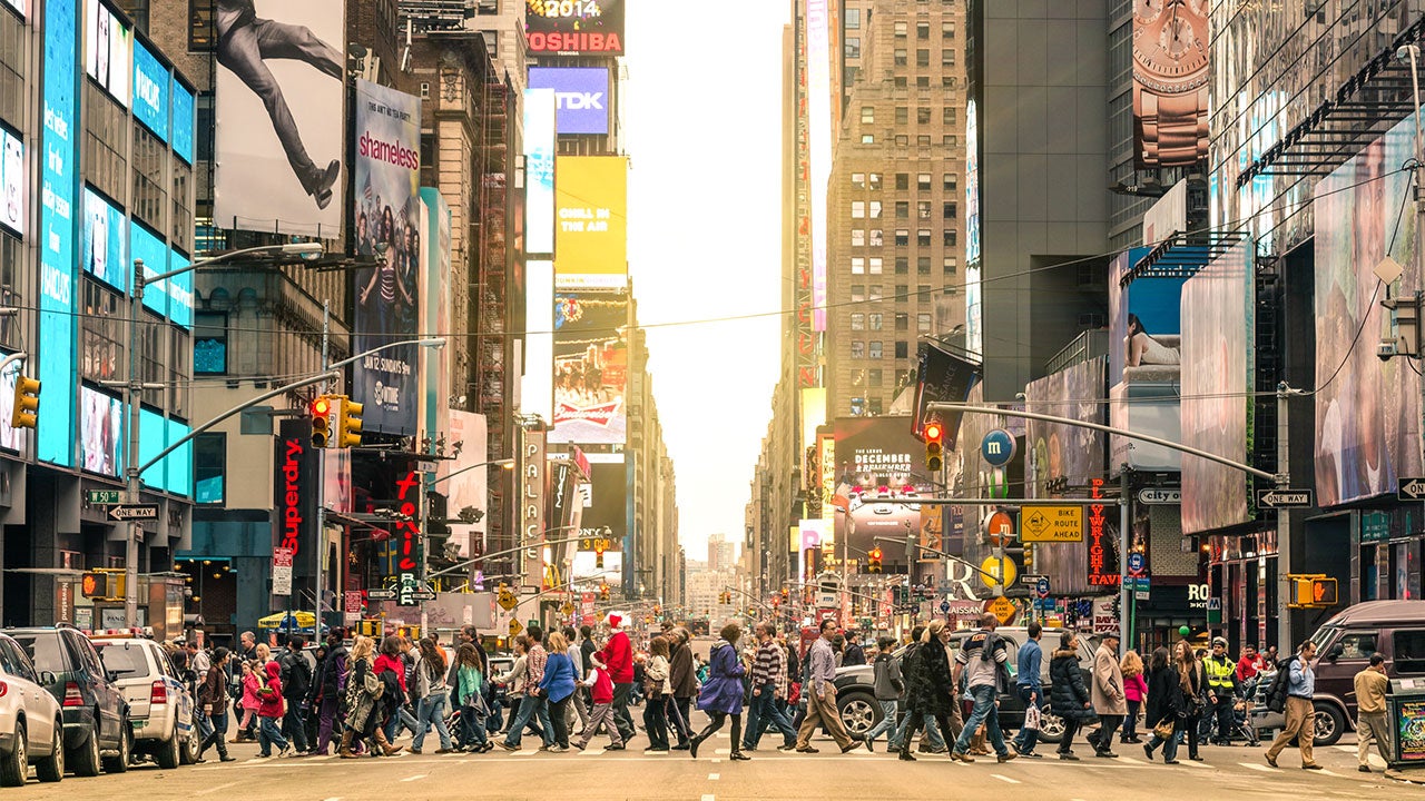 People crossing street at Times Square