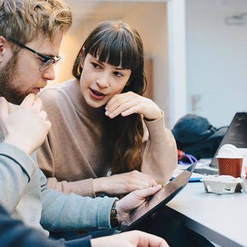 People at working talking over computer
