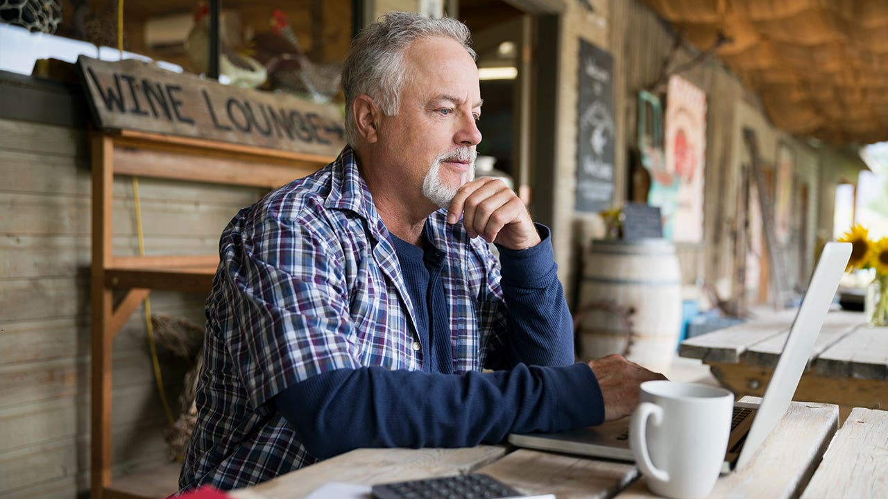 Man paying bill online