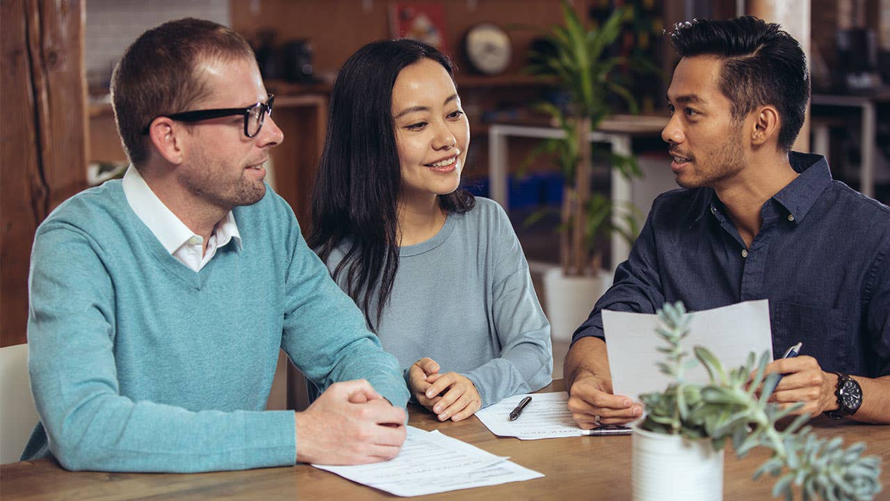 Couple reviewing a rental agreement