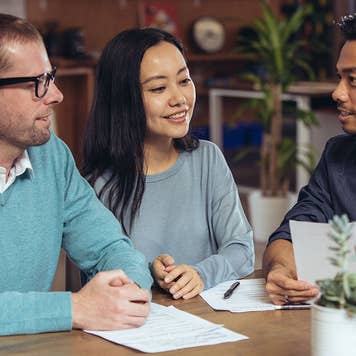 Couple reviewing a rental agreement