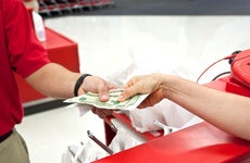 Woman paying with cash