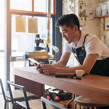 Man using his tablet for online banking
