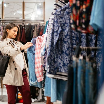 Young woman shopping for clothes
