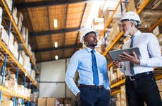 Supply managers in a warehouse