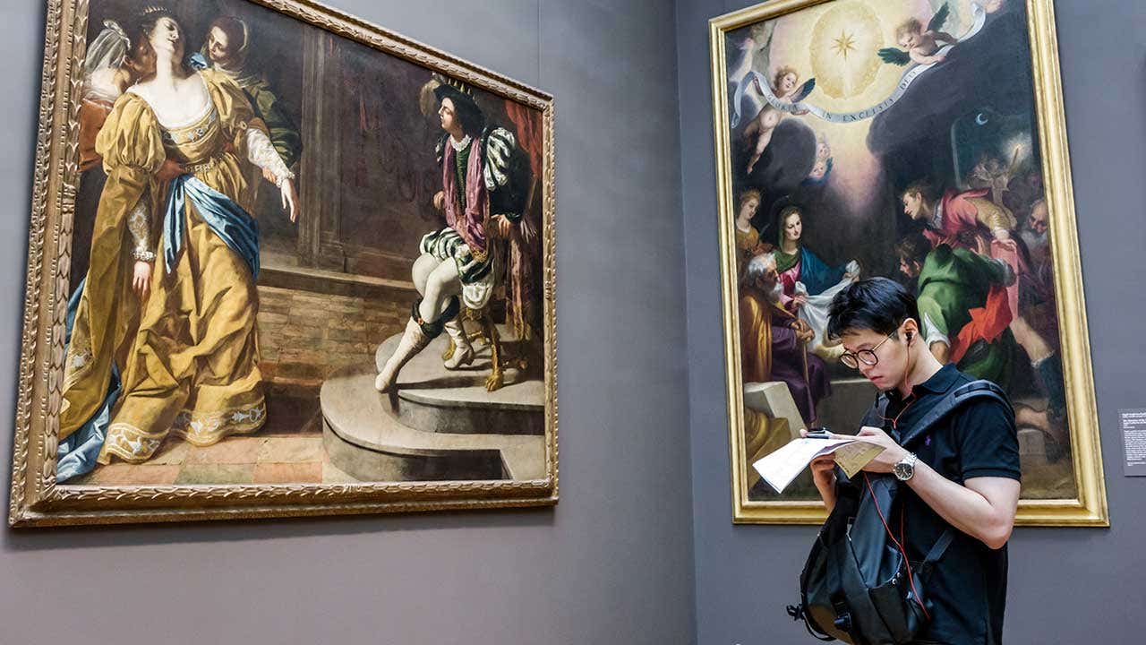 Young man visiting art museum