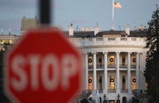Stop sign in front of White House