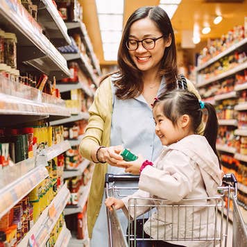 Mother and daughter shopping for food