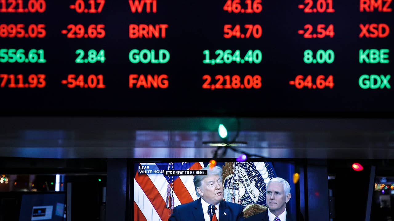 Stock prices and a tv screen at the NYSE