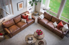 Two leather couches in livingroom