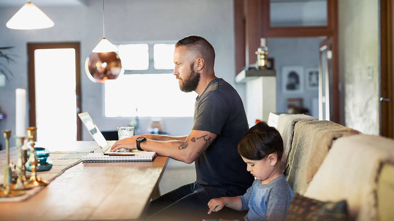 Man on computer in home