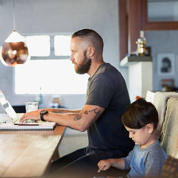 Man on computer in home