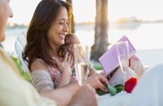 Woman opening Valentines card