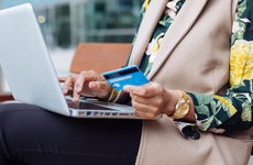 Woman paying credit card online