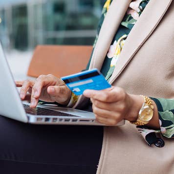 Woman paying credit card online