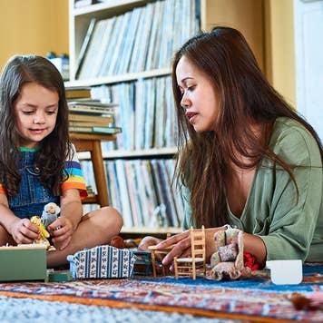 Mother and daughter playing