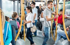 People commuting on bus