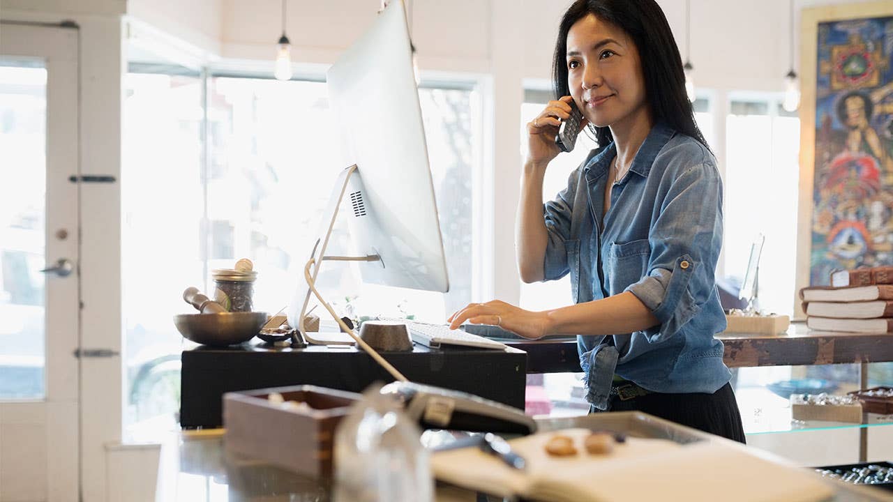 Woman looking at home computer