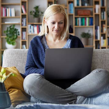 Woman using laptop to set up an IRA online