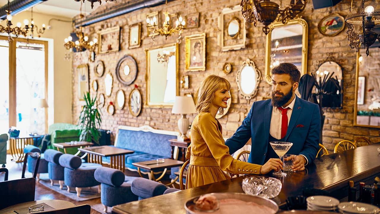 Couple drinking on a date at a bar