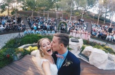 Couple doing a selfie at wedding