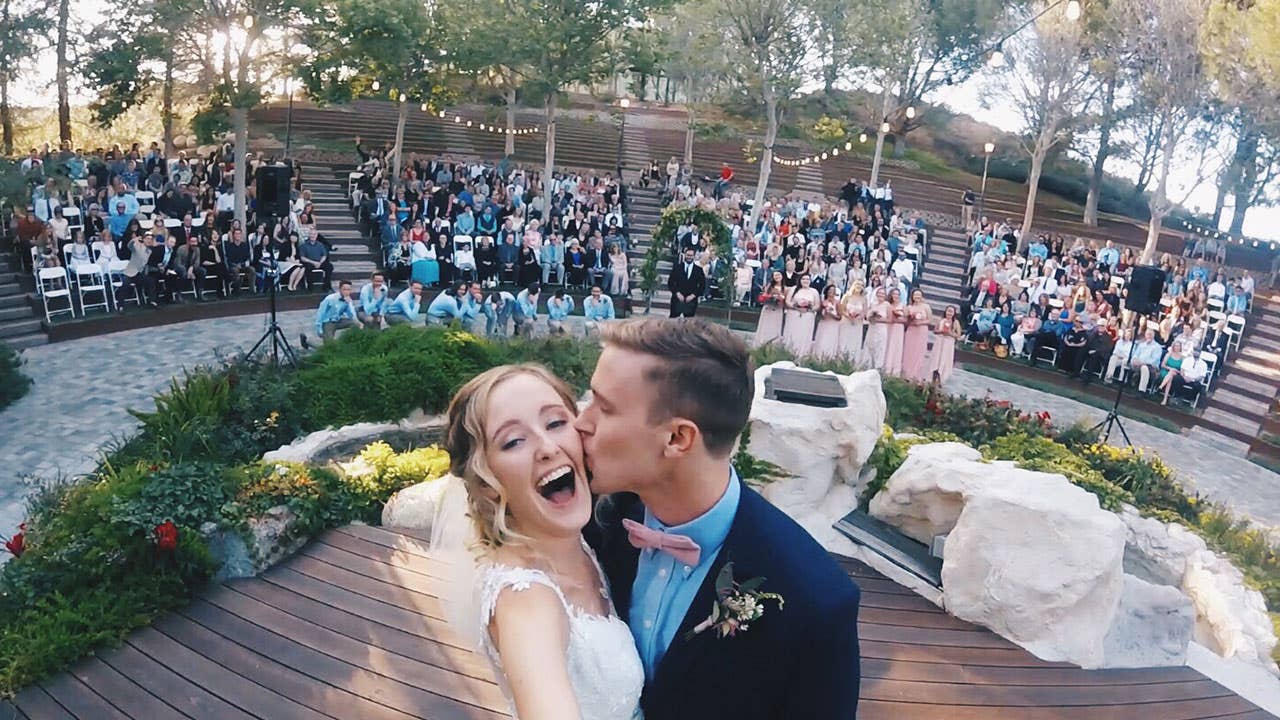 Couple doing a selfie at wedding