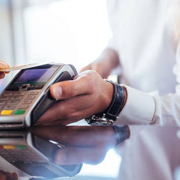 Man paying with credit card