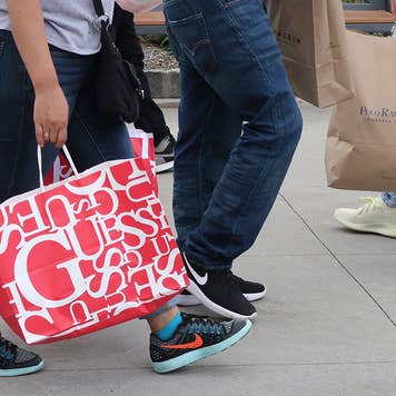 American consumers with big shopping bags