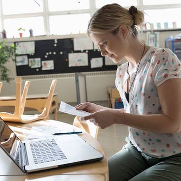 Woman filling out 401k paperwork