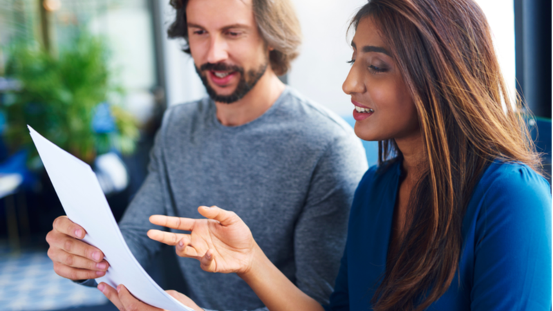 Young couple looking at paperwork together