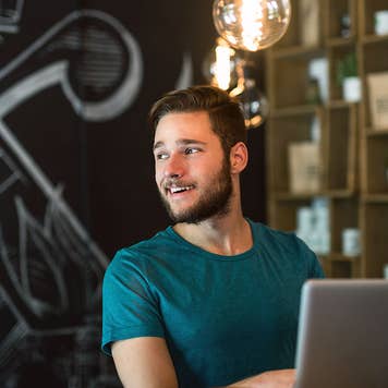 Man using laptop to sign up for a SEP IRA
