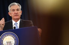 Federal Reserve Chairman Jerome Powell speaks to journalists at a news conference following the Fed's June 19 interest rate decision.