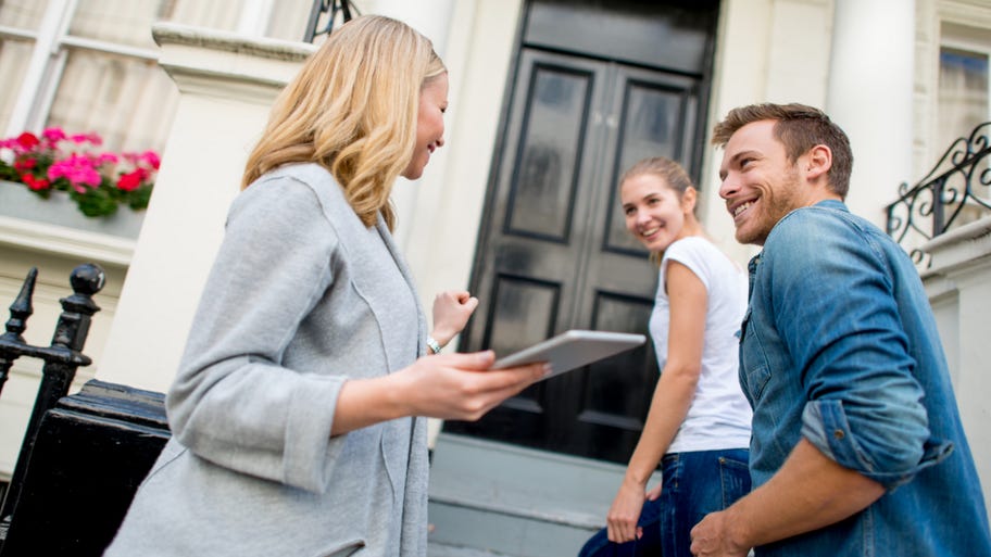 Realtor helping a couple buy a home