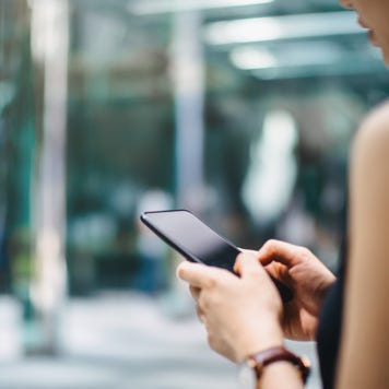 Woman looking at cell phone