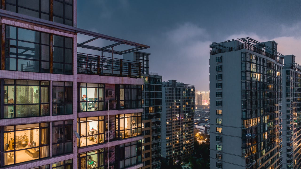 A picture of modern apartment buildings at twilight