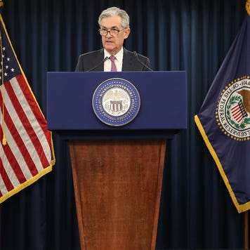 Fed Chairman Jerome Powell speaks to journalists at a June 19 press conference