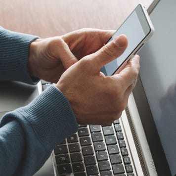 A man use two-factor authentication from his phone