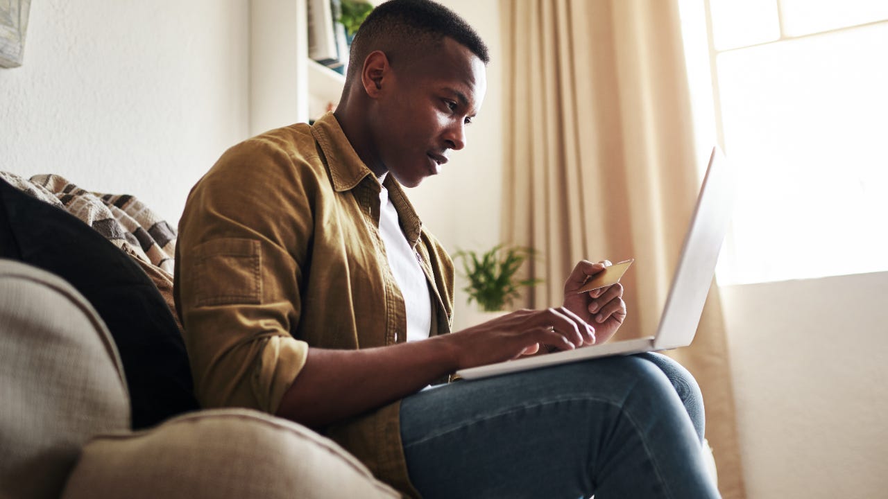 Person paying credit card bill on computer