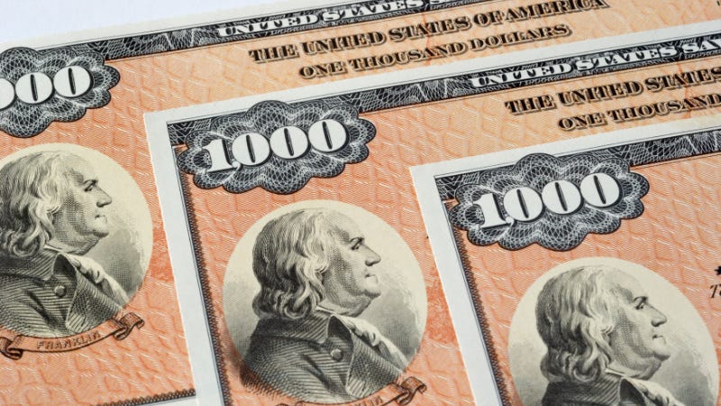 A picture of several U.S. savings bonds