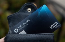 Chase Sapphire Reserve card sticking out from black leather wallet