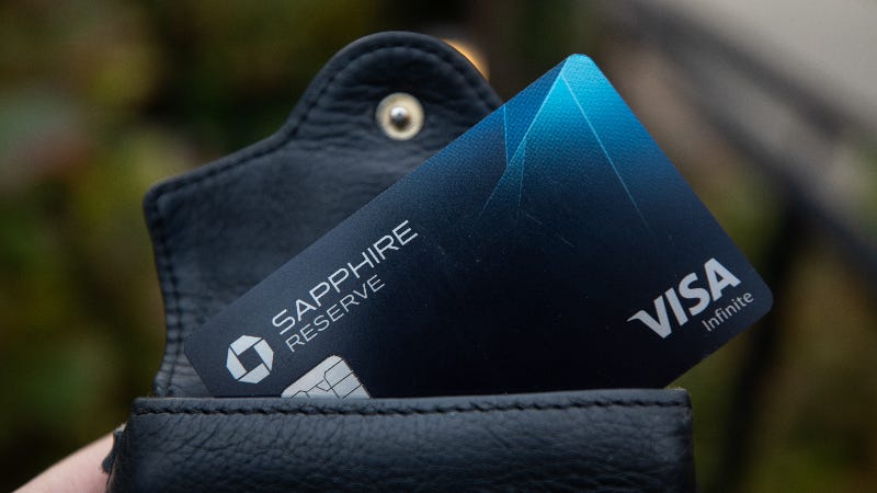 Chase Sapphire Reserve card sticking out from black leather wallet